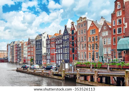 Beautiful views of the streets, ancient buildings, people, embankments of Amsterdam - also call \