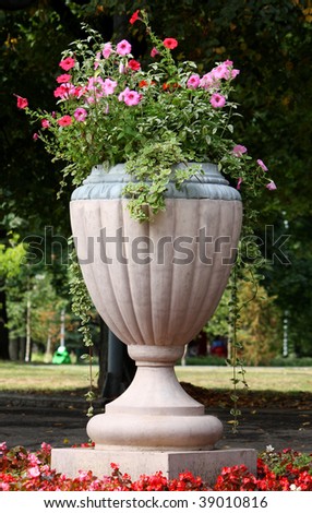 Big vase with flowers in a city park