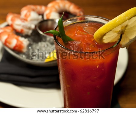 A Bloody Marry with a shrimp cocktail, shot at a French restaurant.