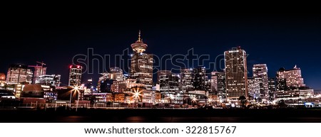VANCOUVER, BC, CANADA - SEPT 12, 2015: The Downtown Vancouver skyline shot at night near Crab Park on the east side.