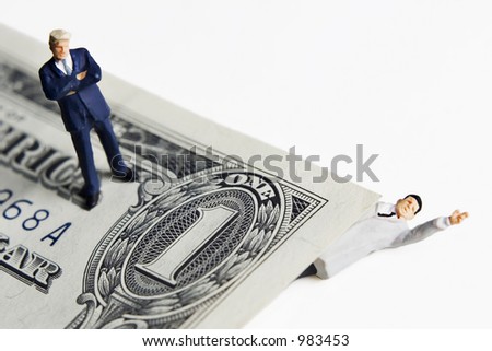 Money problems, business figure standing on dollar