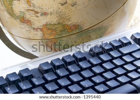 Earth globe and computer keyboard