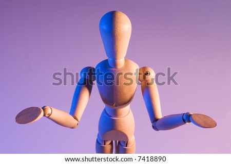 artist\'s mannequin posed as if gesturing