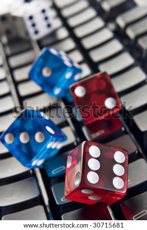 Dice rolled on a computer keyboard