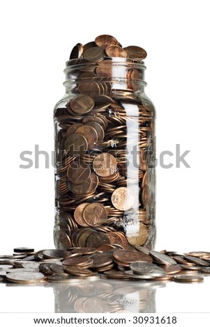 stock photo : Jar of pennies overflowing