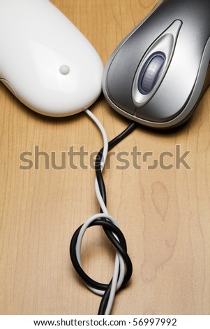 Two computer mouse cords tied together