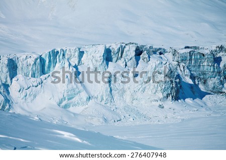 collapsing glacier and frozen lake. Tilicho lake under ice. Annapurna region, Himalayas, Nepal.