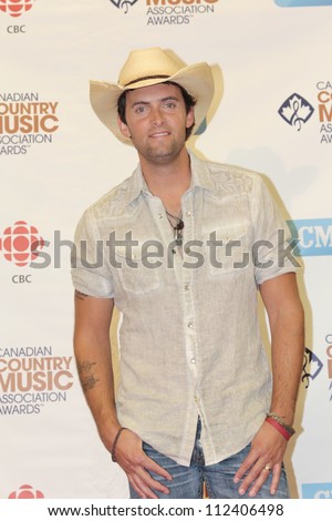 SASKATOON, CANADA - SEPT 9:  Dean Brody, winner of best male artist and album of the year at the 2012 Canadian Country Music Association Awards at Credit Union Centre on Sept 9,2012 in Saskatoon,Canada