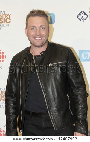 SASKATOON, CANADA - SEPT 9:  Johnny Reid, winner of the Fans Choice award at the 2012 Canadian Country Music Association Awards at Credit Union Centre on September 9, 2012 in Saskatoon, Canada