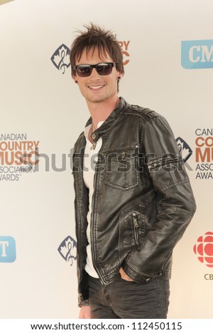 SASKATOON, CANADA - SEPT 9:  Ryan Laird arriving on the Green Carpet of the 2012 Canadian Country Music Association Awards at Credit Union Centre on September 9, 2012 in Saskatoon, Canada