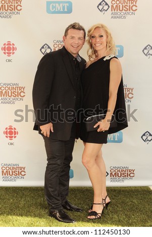 SASKATOON, CANADA - SEPT 9:  Theo & Jennifer Fleury arriving to the 2012 Canadian Country Music Association Awards at Credit Union Centre on September 9, 2012 in Saskatoon, Canada