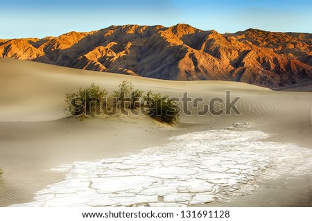 Sand Dunes And Mountains At Death Valley National Park, California, USA