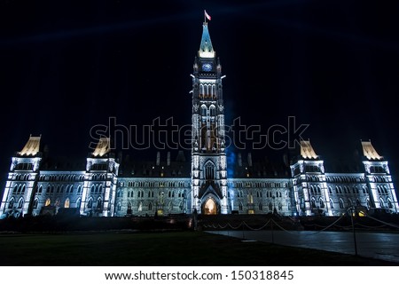 OTTAWA, CANADA AUGUST 5: The light show and narrative called Mosaika projected at night on the Canadian House of Parliament to celebrate the story of Canada on August 5, 2013 in Ottawa, Canada.