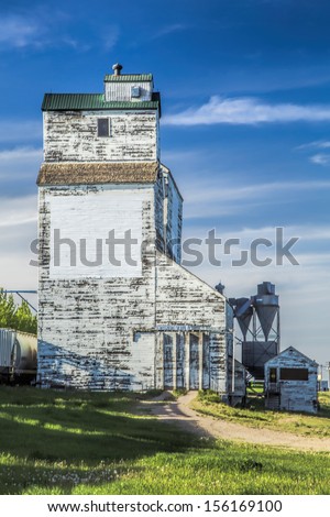Old white grain elevator on the Canadian Prairies