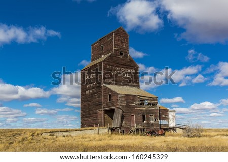 An old vintage wooden grain elevator in the ghost town of Bents, Saskatchewan