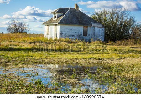 An old abandoned school house used in the early 1900\'s on the Canadian prairies.