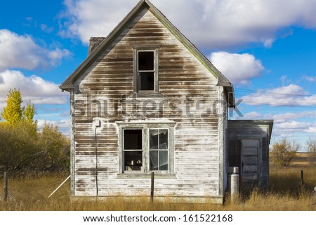 An abandoned old rustic farm house