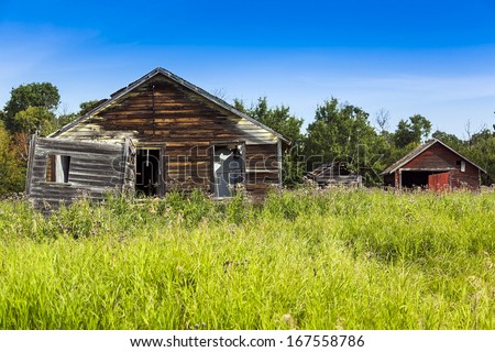 Abandoned farm buildings with weathered wood