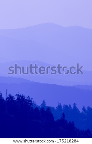 The blue haze that hovers over the Great Smoky Mountains range.  This natural landscape of the layered mountains makes for a great background image.