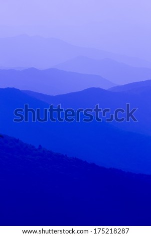 The blue haze that hovers over the Great Smoky Mountains range.  This natural landscape of the layered mountains makes for a great background image.