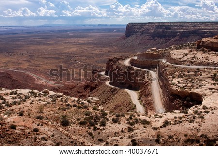 Moki Dugway road leads out of the Valley of the Gods to Muley Point which overlooks Monument Valley, Mexican Hat and the Valley of the Gods.