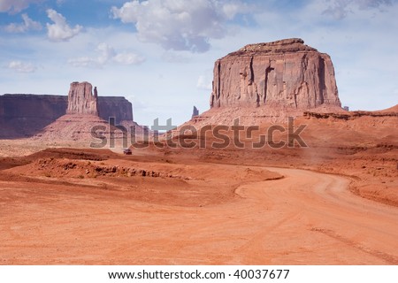 Monument Valley is considered one of the natural wonders of the world because of the beauty of the enormous \