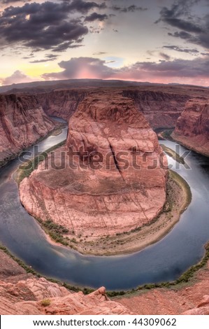 Horseshoe Bend is the name for a horseshoe-shaped meander of the Colorado River located near the town of Page, Arizona and within Glen Canyon National Recreation Area.  Processed using HDR.