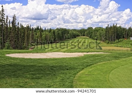 Golf course in the thick forest at Elk Ridge Resort in Saskatchewan, Canada
