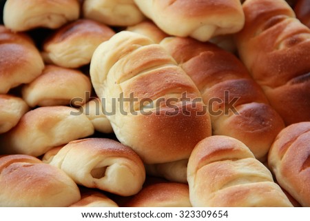 Close up photo of artisan bakery products, some breads and rolls
