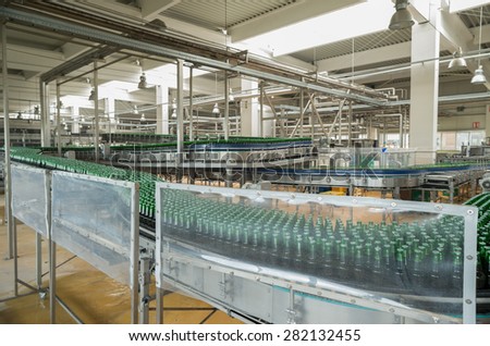A conveyor belt with pasteurized beer in bottles is seen during production process in the  Molson Coors Kamenitza brewery, April 28, 2015, near the city of Haskovo, Bulgaria.
