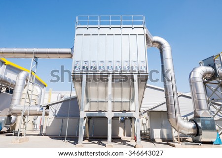 Sofia, Bulgaria, September 14, 2015 - Waste processing silo and pipeline installation for processing recycled waste material and bio gas in a recycling waste to energy factory.