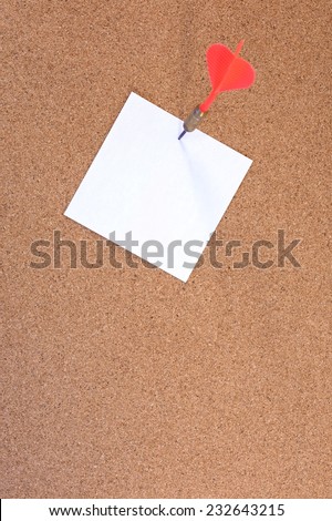 A close up shot of a cork notice board