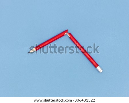 A close up shot of a broken pencil