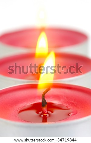 Scented candles isolated against a white background