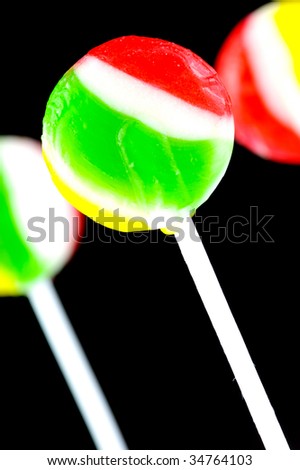 Lolly Pops isolated against a black background