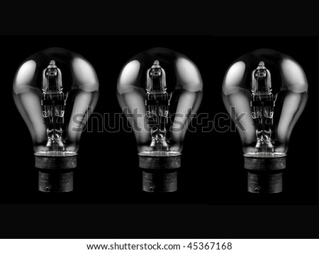 An incandescent light globes isolated against a black background