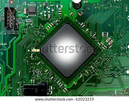A computer chip on a mother board