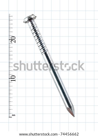 A wood nail isolated against engineering graph paper