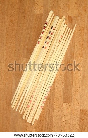 Chop sticks on a wooden kitchen bench