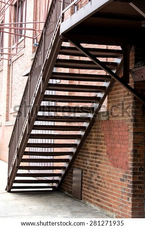 Fire escape stairs in an alley