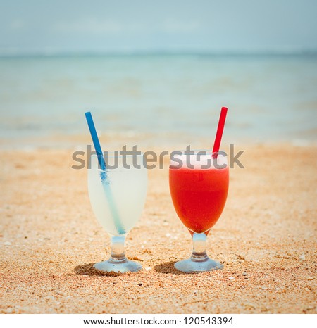 Fresh fruit cocktails on a tropical island beach