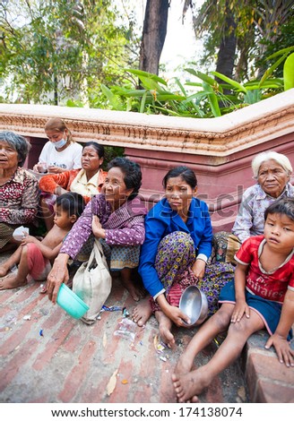 PHNOM PENH, CAMBODIA - 31 JANUARY 2014 Dirty homeless people in Phnom Penh, Cambodia