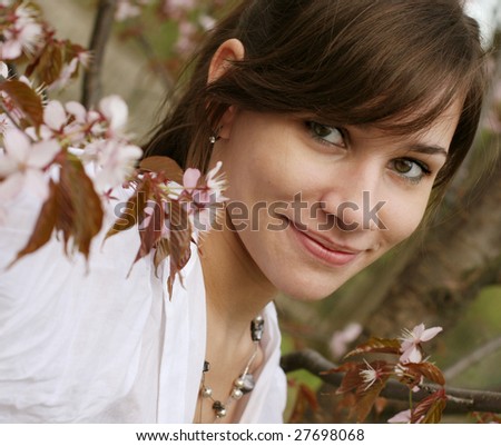 Beautiful woman with cherry blossom