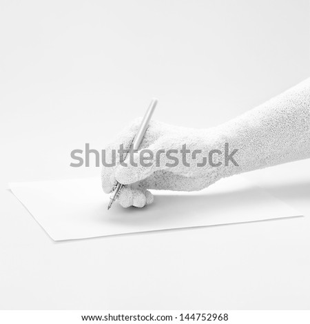 The white man\'s hand, ready for drawing with a white pen. Isolated on white.