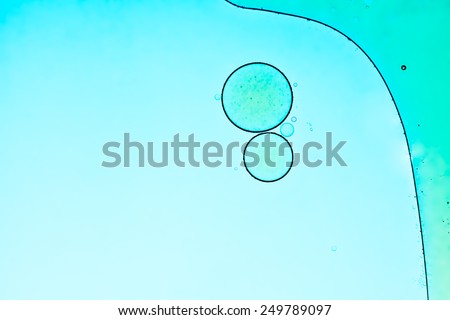 Oil blue bubbles abstract white background