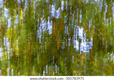 Green leaves moving abstract background, fast moving