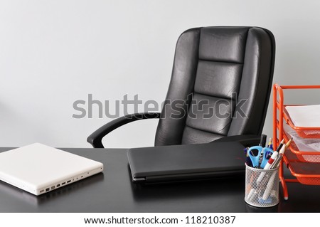 Office desk with two laptops, job or business concept