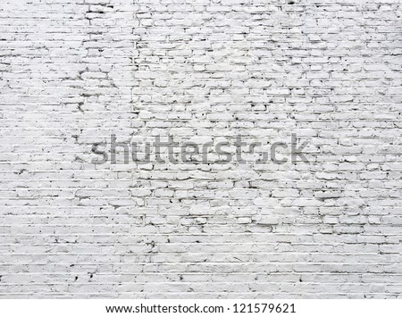 Cracked white brick wall background
