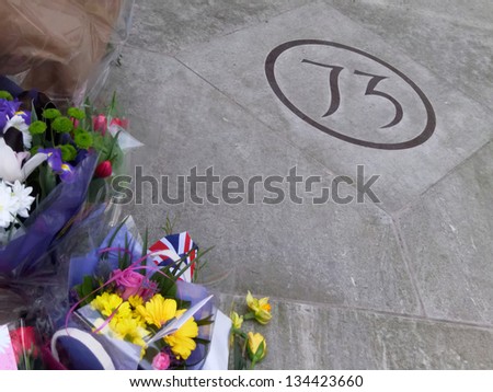 LONDON - UK, April 08: Flowers and messages in front of Margaret Thatcher's residence on Chester Square on April 8, 2013 in London.