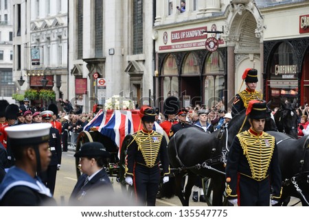LONDON - UK, APRIL 17: Baroness Thatcher\'s coffin is carried on a gun carriage on its way to St Paul\'s Cathedral, on April 17, 2013 in London.
